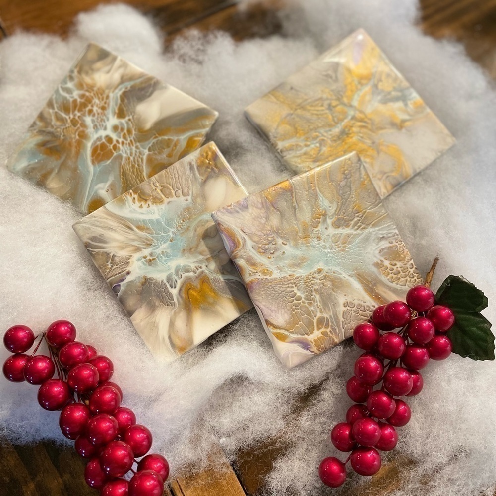 Set of 4 hand painted coasters. Sealed with resin cork backing